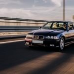 vintage-sedan-car-driving-road_114579-5065
